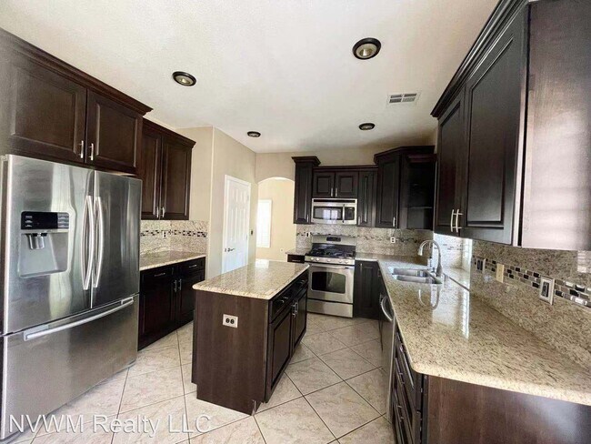 Building Photo - 3 br, 2.5 bath House - 11257 Playa Caribe Ave