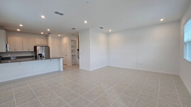 Foto del edificio - Brand-New Apopka 4Bed/2.5 Bath Townhome Avail for Rent! Be The first to Live Here!