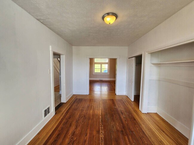 Building Photo - AVAILABLE JUNE 2026 - 3 Bedroom, 2 Bath Home w/ Wood Flooring & Fenced-in Yard!!!