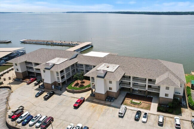 Building Photo - Riverfront Living with Spacious Layout and...
