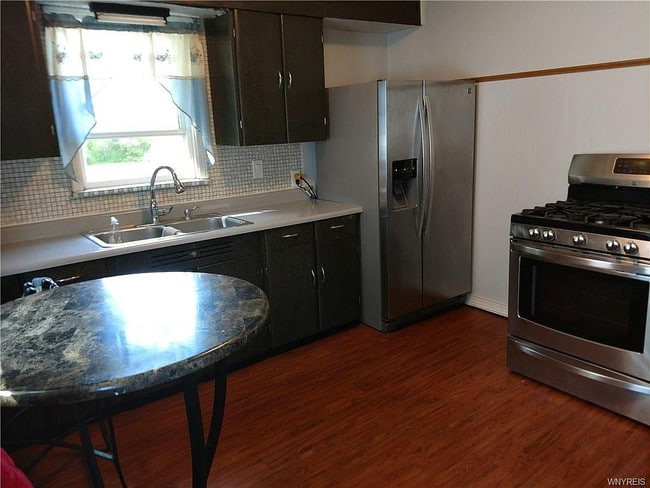 Foto del edificio - 8415 Homestead Ave