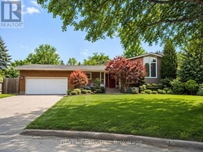 Building Photo - 7285 Rolling Acres Crescent