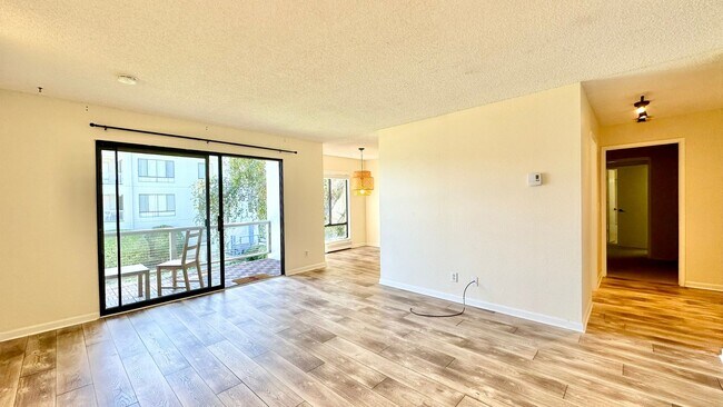 Building Photo - Lovely and Spacious Condo with a Water/Lagoon View and Resort Style Amenities!