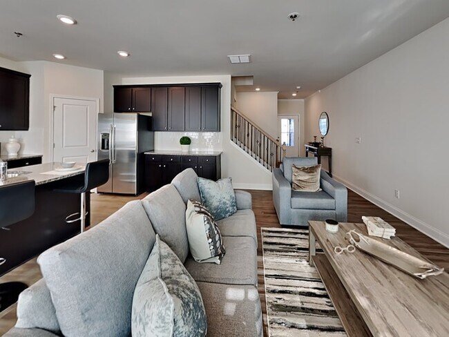Building Photo - Come Tour! Newly Built 4BR model Townhome ...