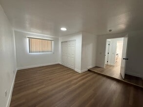 Building Photo - 8901 1/2 Holmes Ave