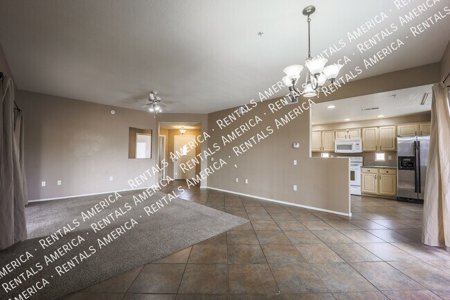 Foto del edificio - 9555 E Raintree Dr