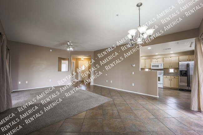 Building Photo - 9555 E Raintree Dr