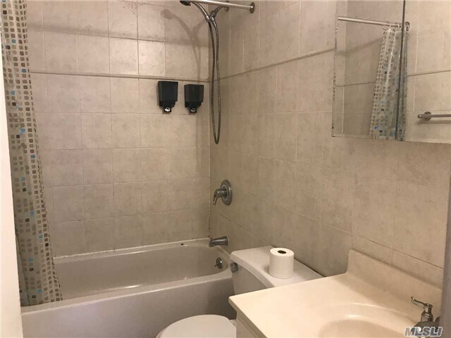 Foto del edificio - 121-24-121-28 8th Ave