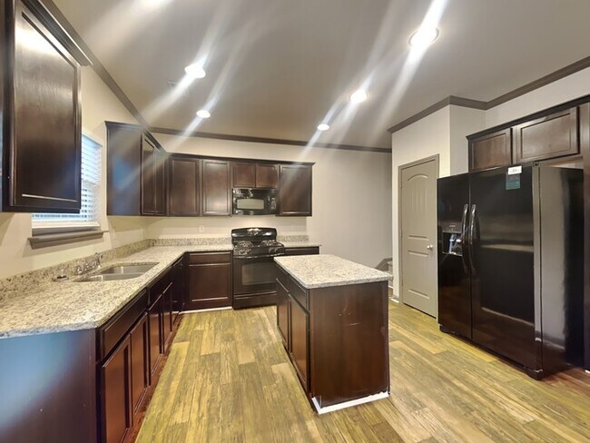 Building Photo - ONE MONTH FREE! Beautiful 4 Bedroom Home l...