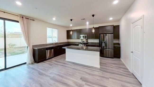 Building Photo - PRICE REDUCTION! Beautiful 4 Bedroom 3 Bat...
