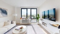 Located on the 8th floor at 280 Broadway in Bayonne, NJ, this thoughtfully designed 2-bedroom, 2-bathroom residence offers a bright, modern living experience with an open-concept layout and high-quality finishes throughout. Light oak hardwood flooring flows seamlessly across the entire space, complementing the clean white walls and contemporary aesthetic.

The kitchen is a standout feature, equipped with stainless steel appliances including a French door refrigerator and electric range, warm wood cabinetry paired with white upper cabinets, and a striking quartz-topped island with seating — ideal for casual dining or entertaining. The kitchen opens directly to the combined living and dining area, which is bathed in natural light from large, black-framed floor-to-ceiling windows offering sweeping views of the Bayonne skyline and beyond.

The spacious primary bedroom enjoys generous proportions, its own large window with scenic views, and a serene, light-filled atmosphere. The second bedroom is equally well-appointed with light-toned finishes and a tranquil ambiance.

Each bathroom reflects refined design sensibilities. One features floor-to-ceiling grey stone-look tiles, a floating wood vanity, and an illuminated mirror. The second showcases bold vertical blue subway tiles, wood-look flooring, a floating vanity, and open wooden shelving — adding a distinctive, modern character to the space.