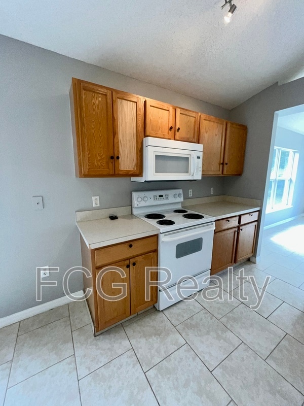 Foto del edificio - 5819 Windridge Dr