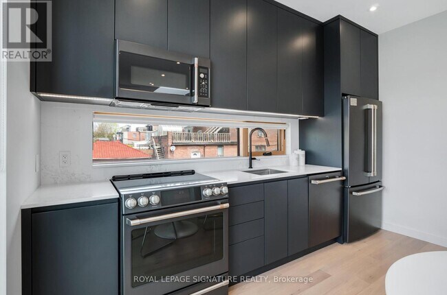 Photo du bâtiment - 54 Dewhurst Blvd