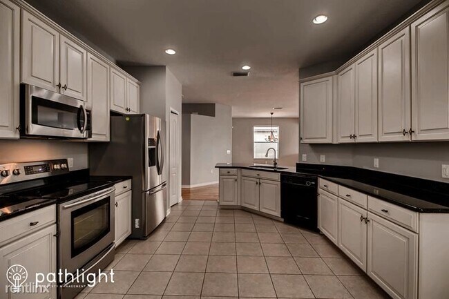 Building Photo - 4 br, 3 bath House - 12801 Tikal Way UNIT