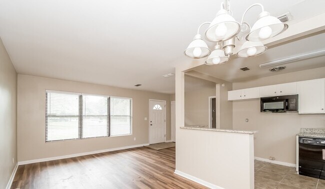 Building Photo - 7023 Cherbourg Ave N