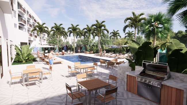 Zona de barbacoa con piscina al fondo. - The Promenade at Town Center