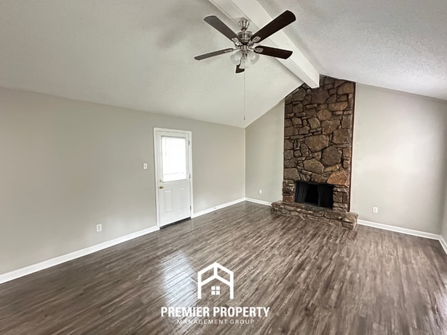 Photo - Quiet 3BR/2BA Cove Near Southwind | Soaring Ceilings & Floor-to-Ceiling Stone Fireplace House