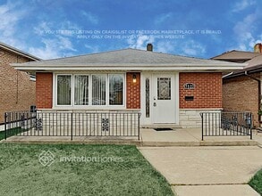 Building Photo - 7522 S Lockwood Ave