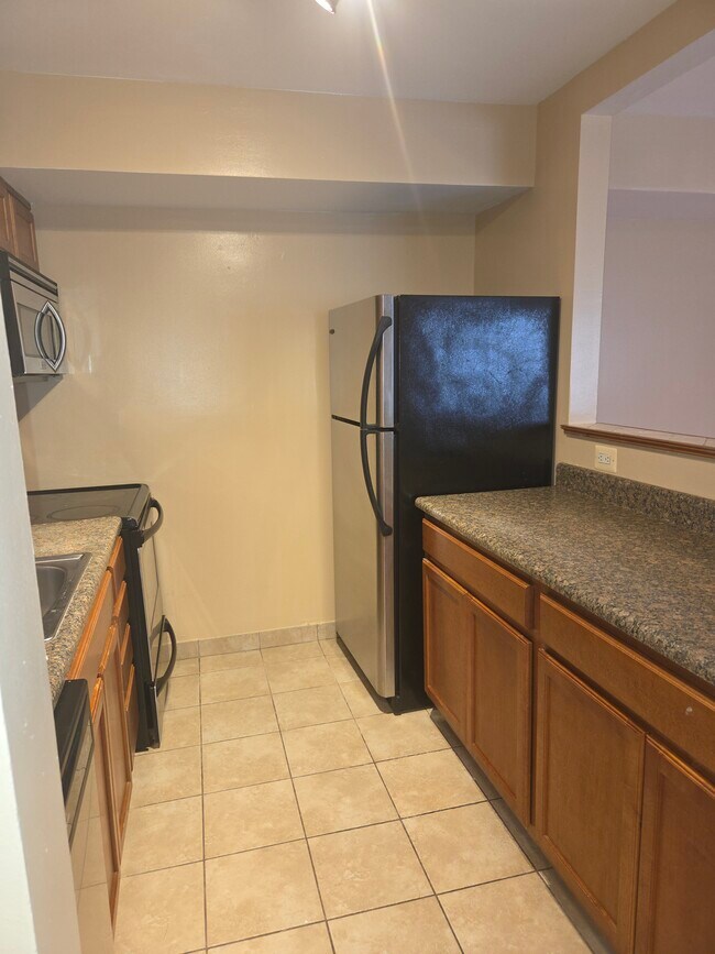 Kitchen with granite counter tops - 6300 Hil Mar Dr