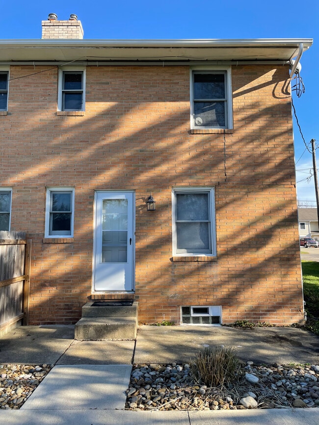 Backdoor to available unit - 8451 Pleasantwood Ave NW
