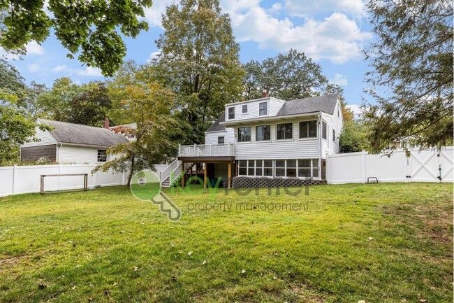 Building Photo - Spacious 4-Bedroom Home with Huge Fenced Y...