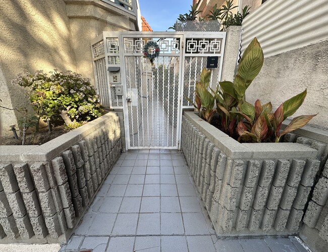 Secure Entry Gate - 435 W Lexington Dr