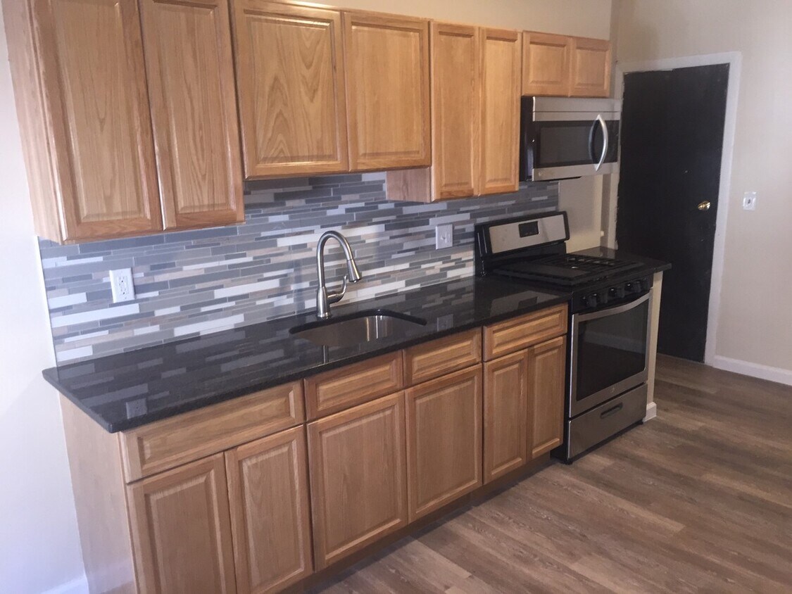 Granite countertops, stainless steel appliances - 52 Lawlor St