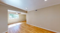 Located at 1680 Blue Jay Dr in Sunnyvale, CA, this single-story home offers a well-maintained interior with a clean, functional design throughout. The main living areas are finished with warm hardwood flooring that reflects natural light, contributing to a bright and inviting atmosphere. Crown molding and recessed lighting add refined detail to the living spaces, while a ceiling fan provides additional comfort in the main living area, which also benefits from a window overlooking the outdoors.

The kitchen is a standout feature, equipped with rich wood cabinetry, granite countertops with warm gold tones, a mosaic tile backsplash, and stainless steel appliances including a refrigerator, dishwasher, and electric range. Recessed lighting and hardwood flooring complete the space, making it both practical and visually appealing.

The bedroom is carpeted for comfort and includes a ceiling fan and a window allowing natural light to enter. Additional rooms feature hardwood flooring and crown molding, maintaining a consistent aesthetic throughout the home.

The bathroom is appointed with dark espresso cabinetry, a granite-topped vanity, an undermount sink with brushed nickel fixtures, and an overhead storage cabinet, providing ample storage in a compact, well-organized space.