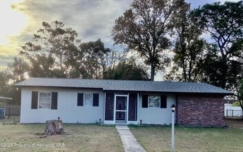 Building Photo - 7322 Pinehurst Dr