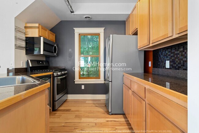 Foto del edificio - Two-Bedroom End Unit Condo in Goose Hollow! DEPOSIT SPECIAL