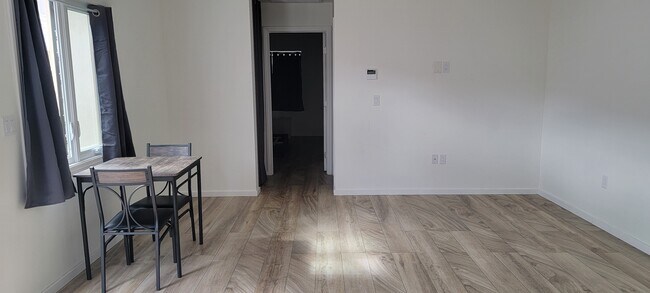 Spacious living/dining room. - 3635 Montrose Ave