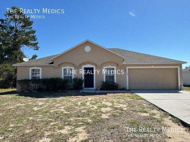 Building Photo - Charming 3-Bedroom Home in Poinciana – You...