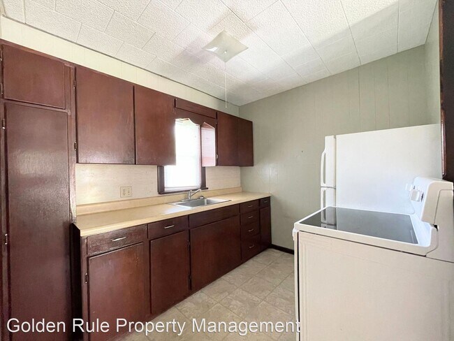 Building Photo - 1 br, 1 bath House - 813 E 8th Ave
