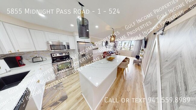 Building Photo - 5855 Midnight Pass Rd