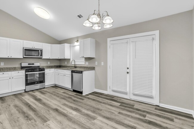 Building Photo - 6017 Happy Trails Ct