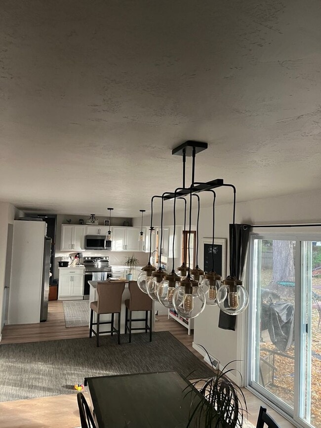 Building Photo - Spacious 4-Bedroom Home with Finished Basement & Garage