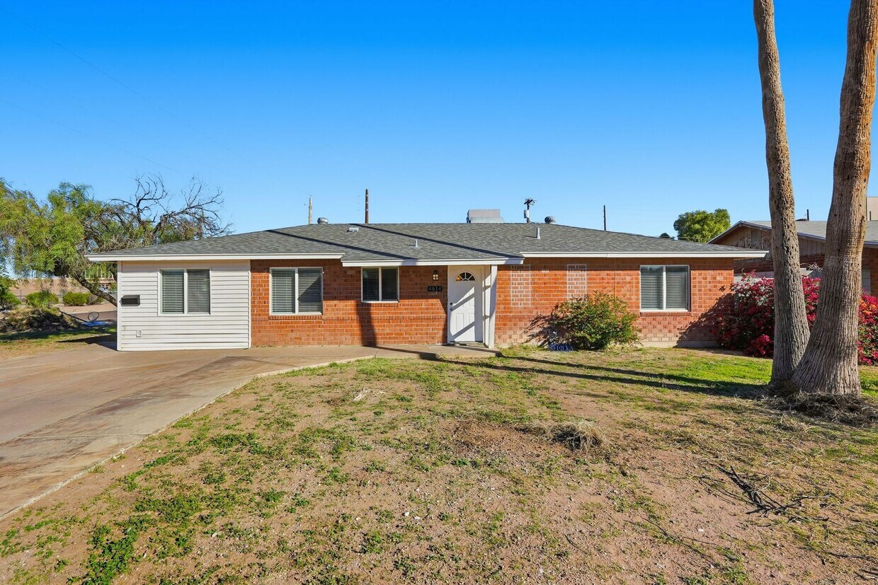 **Charming 3-bedroom, 2-bath Home** - **Charming 3-bedroom, 2-bath Home**