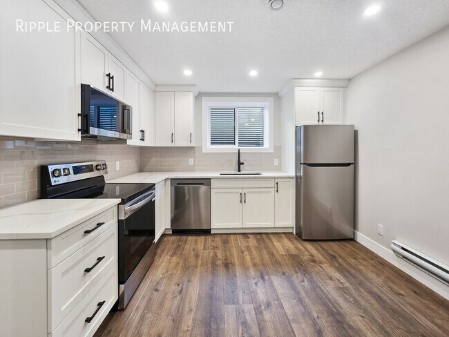 Photo du bâtiment - BRAND NEW 2 BEDS 1 BATH LOWER UNIT