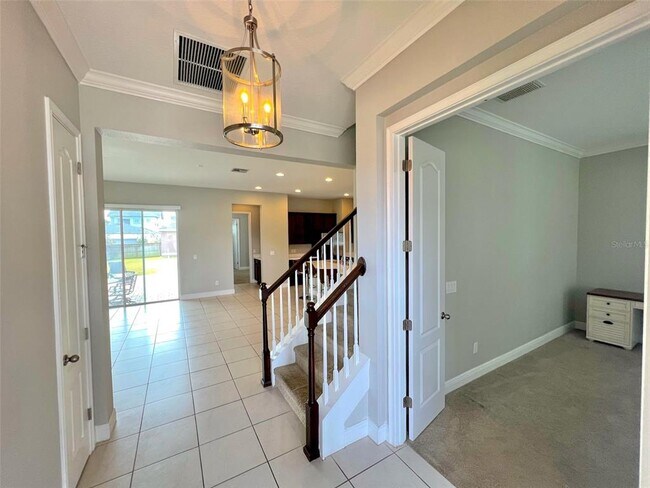 Building Photo - 9086 Tavistock Lakes Blvd