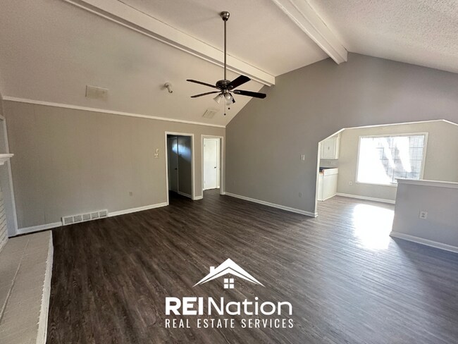 Building Photo - BARTLETT CHARMER! 3BR/2BA | Vaulted Ceilings & Brick Fireplace | 2-Car Garage!