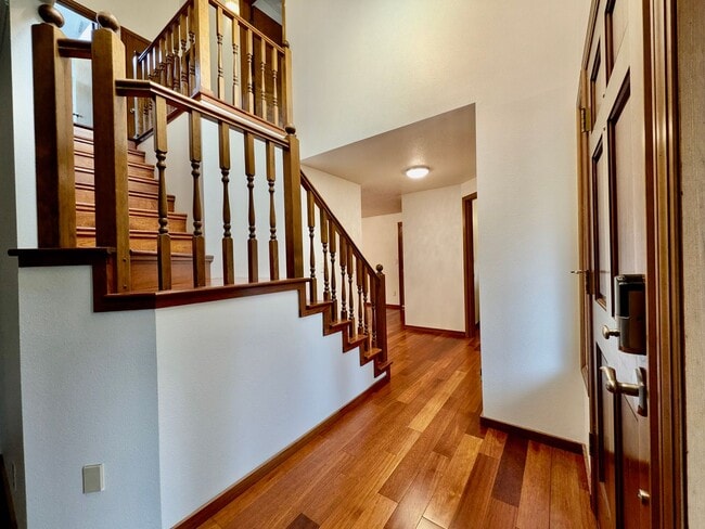 Building Photo - This Charming 3-Bedroom, 2.5-Bathroom Home, Spanning 1878 Square Feet, Offers Gorgeous Hardwood F...