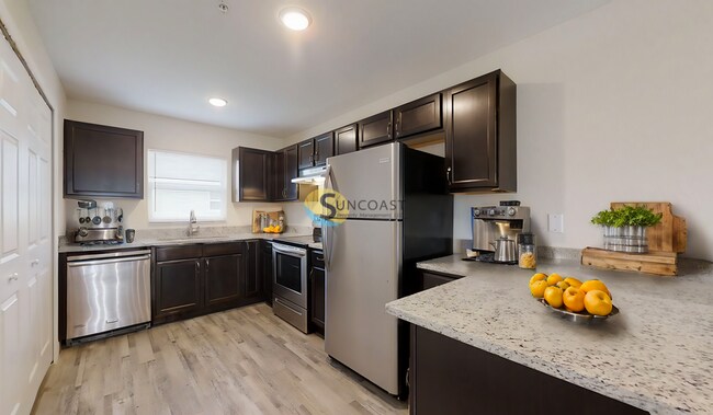 Foto del edificio - 9021 N Travis Dr