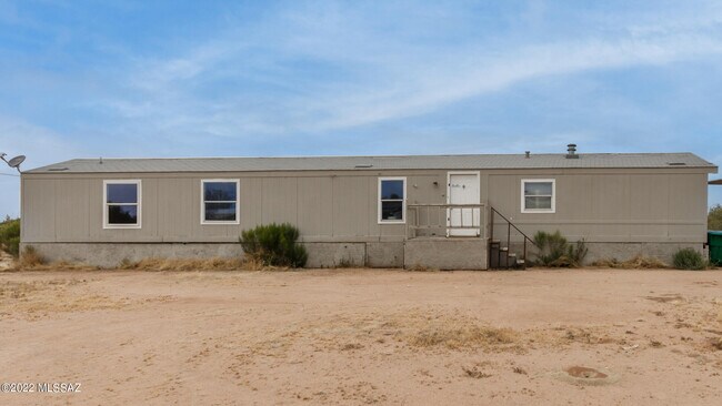 Building Photo - 7697 N Steele Dr