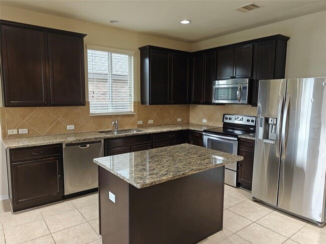 Building Photo - 5610 Hopkins Dr