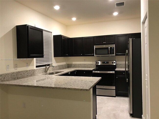 Foto del edificio - 10390 W 33rd Ln