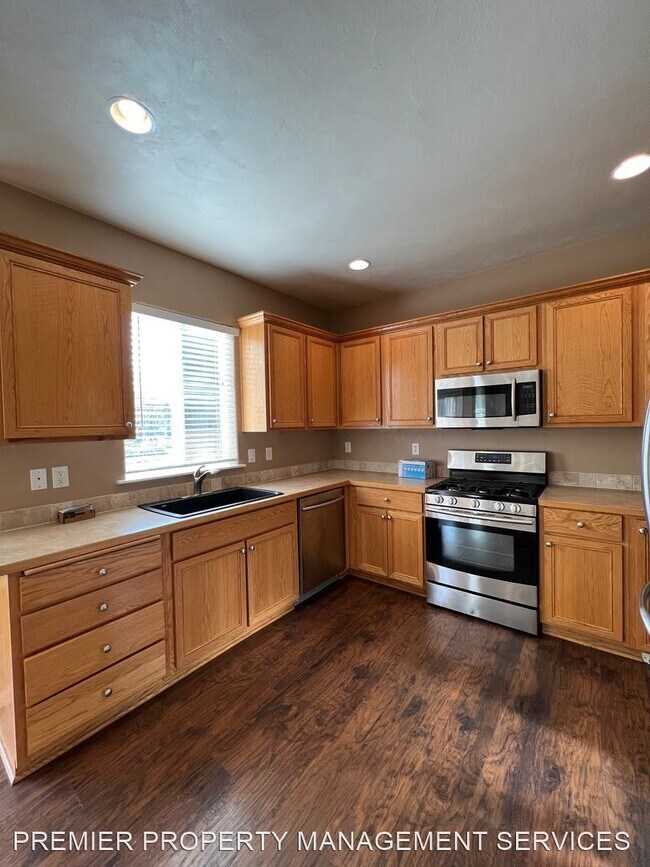 Building Photo - 3 br, 2.5 bath House - 5586 King Arthur Court