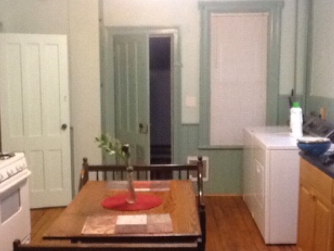 Kitchen with laundry - 1029 Downer Ave