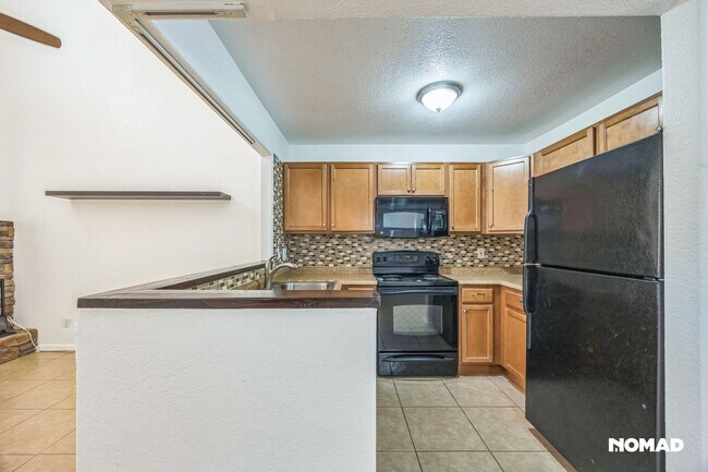 Foto del edificio - Charming 2BR Townhome in Phoenix
