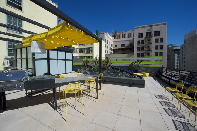 Rooftop BBQ and Dining Area - The Broadway Lofts