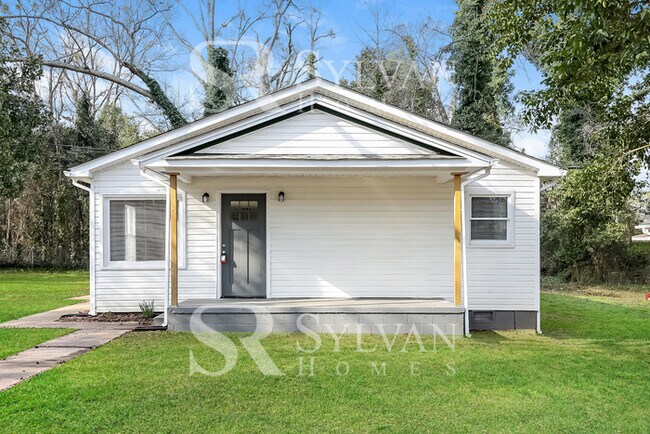 Building Photo - Turn the key. Enter. Smile. Repeat every day!